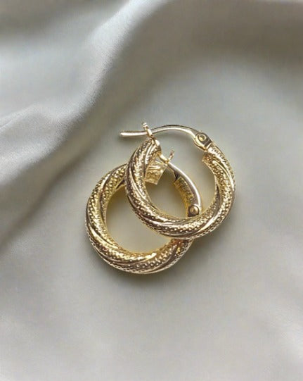 Glimmering Frosted Twist Hoops in Yellow Gold